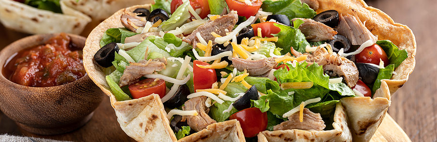 Heart healthy taco salad on wooden background