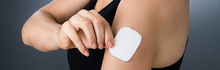 woman with clonidine patch on her arm hypertension