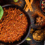 a group of bowls of spices and herbs that lower blood pressure