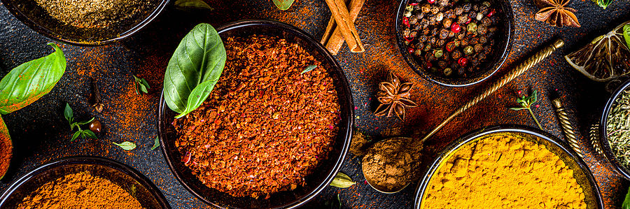 a group of bowls of spices and herbs that lower blood pressure